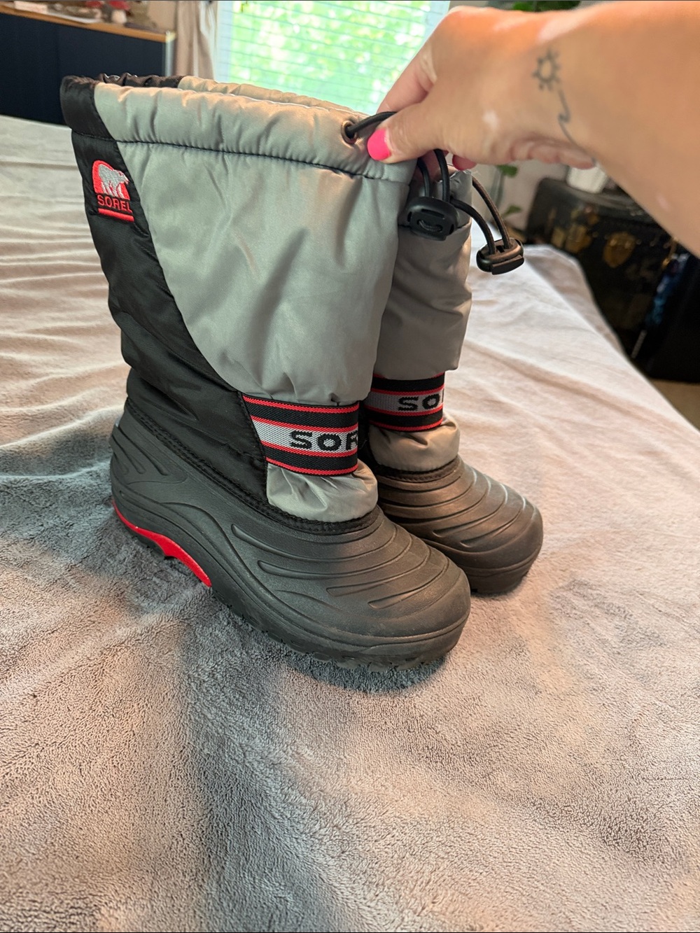 Sorel Kids' Black and Gray Winter Boots with Red Trim